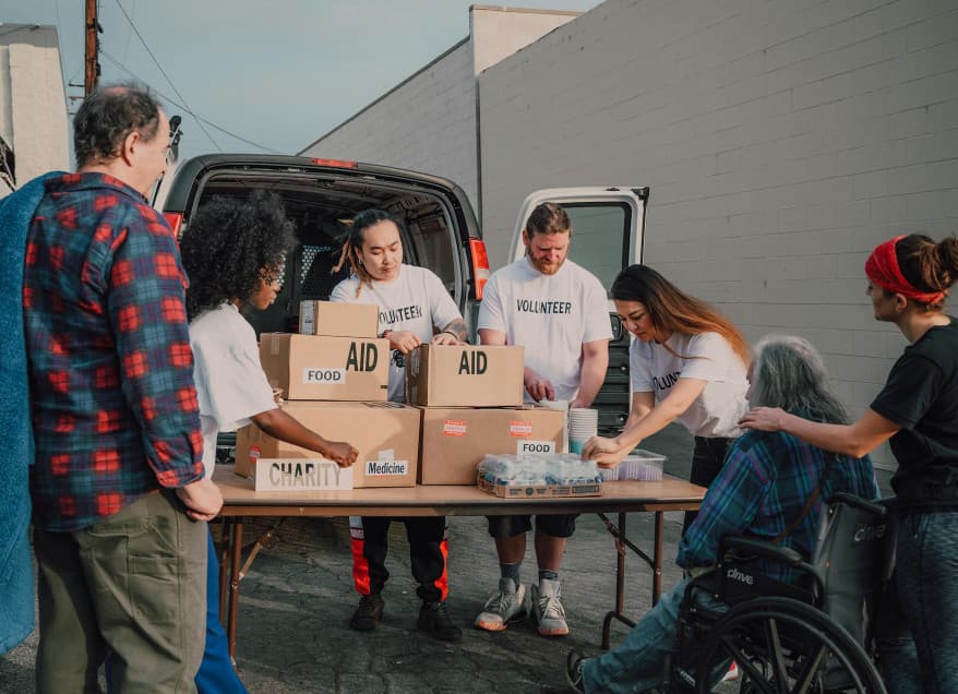Unloading truck full of boxes and putting them on a table